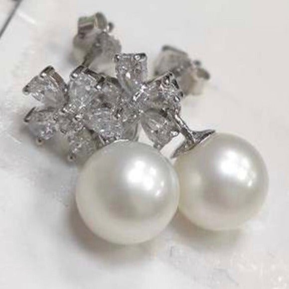 925S Flower Shape Stud Earrings With Round Natural Pearl And Zirconia - Picture 1 of 16
